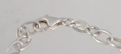 A 925 silver bracelet with pierced and plain marquise decorative links, with lobster claw clasp.