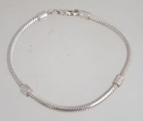 A silver snakelinked bracelet with lobster clasp marked 925. Size 19cms long. weight 12.