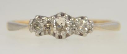 An 18ct gold and diamond 3 stone ladies ring. The diamonds approx 20pnts.
