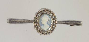 An early 20th century ladies silver bar brooch with central wedgwood jasperware cameo of a maiden.
