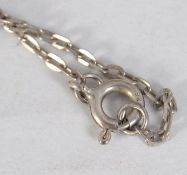 A 925 silver pendant necklace with a CZ set pierced heart pendant on a silver chain. Marked 925.