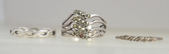 3 vintage silver rings, one being a lattice eternity ring, the other rope twist and stone set.