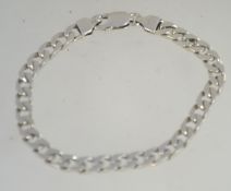 A silver and Murano milliefiori style art glass ladies bracelet having coloured glass and silver