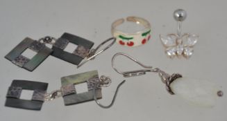 2 contemporary silver and mother of pearl earrings together with a crystal and silver mount pendant,