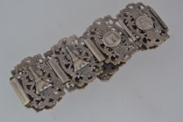 A vintage white metal link bracelet with Parisian souvenir motifs with hook clasp