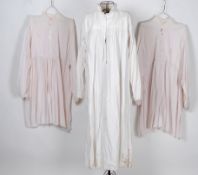 SMOCK TOPS: Two original ivory coloured