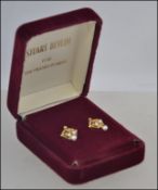 A pair of 18ct gold Royal Crown Tiara earrings designed by Stuart Devlin,