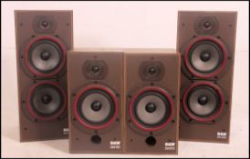 A pair of retro 20th century Bower and Wilkind D 220 speakers along with a pair of Bower and