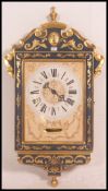 A beautiful French blue and gilt wall clock with roman numeral chapter ring, faceted hands.
