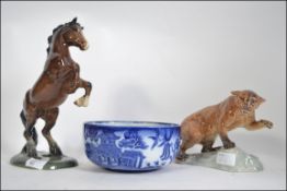 BESWICK ENGLAND , rearing horse - 1014 , cougar - 1823 , along with Doulton Burslem Willow Bowl.