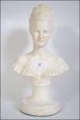 A 20th century classical bust of a young lady raised on a socle base H38cm