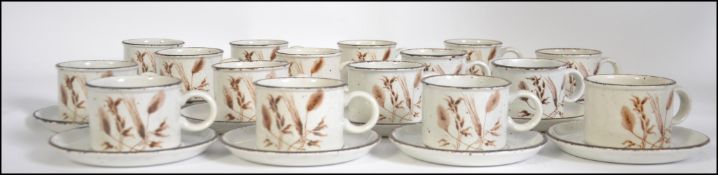 A collection sixteen of Midwinter ' Wild Oats ' pattern cups and saucers stamped to the base