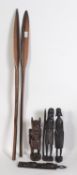 A collection of African tribal carvings to include statues and 2 spears ( 6 items total )