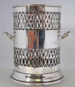 A vintage 20th century silver plated syphon bottle holder, having twin handles atop,