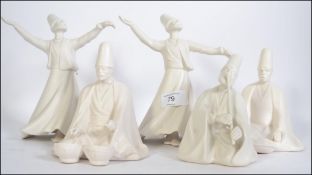 A collection of five Yildiz Pasabahke porcelain Turkish whirling Dervish dancer and musician Islam