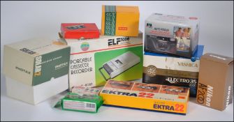 A collection of cameras to include a Yashica Elektra 35, Nikon AF 200 lens, Kodak Ektra,