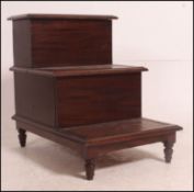 Victorian solid mahogany and brown tooled leather set of library steps being raised on turned legs