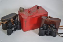 A pair of cased 20th century Carl Zeiss binoculars along with another pair of cased binoculars