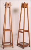 A good pair of mid century oak tapering Industrial office - school staff room hat - coat stands.