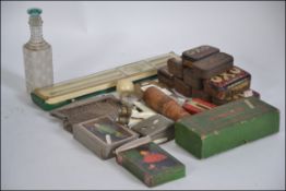 A dealers lot to include vintage playing cards, vintage slide rule, OXO tins,