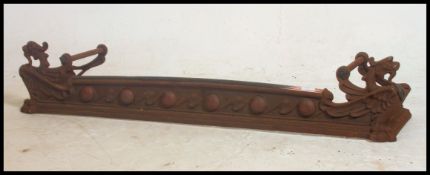 A Beautiful Victorian Art Nouveau fireplace fender of medium proportion.