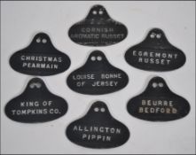 A unusual collection of vintage metal apple labels, all with notations for Crown buildings,