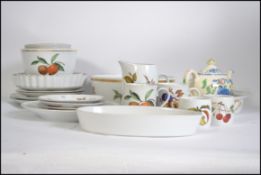 Royal Worcester Evesham part service to include : fluted flan dishes , salad bowl , cups ,
