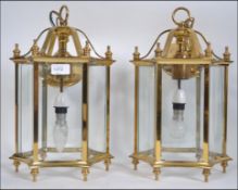 A pair of 20th century Georgian style hanging light fixture,