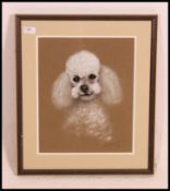 Bryson. A framed and glazed pastel study - painting of a toy poodle being signed by the artist. .