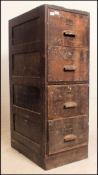 An early 20th century wooden Industrial factory 4 drawer filing cabinet.