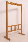 A retro 1960's painted pine school hat and coat stand.