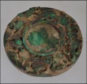 A large Oriental carved jade carved bi depicting dragons and other mythical beasts W8cm