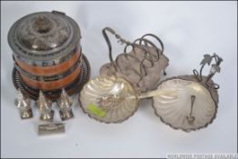 A stunning silver plate toast rack having a spiral rack adjoining a scalloped shaped preserve dish