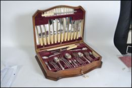 A stunning early to mid 20th century cased canteen of cutlery con siting of a six person