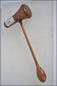 A possible 19th century olive wood treen orthopedic reflex hammer,