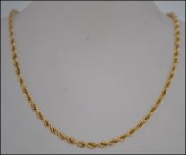 A ladies 20th century triple link 9ct gold ( stamped 375 ) rope twist necklace 5.