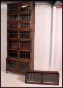 An Edwardian large Globe Wernicke style oak and leaded glass eight section tall stacking lawyers /