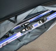 Two pairs of unused Techno Pro Skies having Solomon C509 clips together with a pair of ski poles