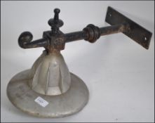 A vintage industrial exterior wall / factory light with original cast iron bracket L44cm
