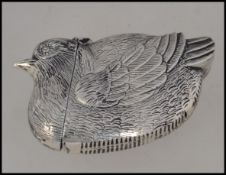 A silver plated vesta case in the form of a hen W6cm