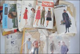 A collection of retro sewing patterns various patterns and designs most with templates