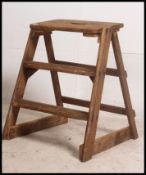 A 20th century Industrial pine 3 step ladder. Of pine construction with fixed setting, 3 steps.