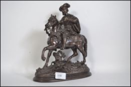 A Victorian Spelter figure, depicting an Elizabethan style horse and rider,