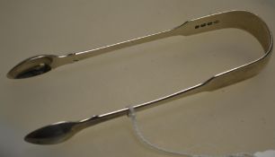 A pair of Georgian 18th century silver hallmarked sugar tongs possibly by John Meek,, London 1823.