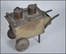 A Novelty lighter in the form of a chestnut cart dating to the 1950's ( see illustrations) H14cm