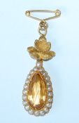An 18ct gold Edwardian pendant brooch pin set with central teardrop citrine, approx 3cts,