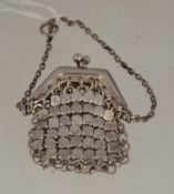 A silver ladies sovereign mesh purse with chain Total weight 13g.