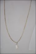 A silver ( stamped 925 ) rope twist necklace 60cm long together with a silver pendant of a duckling.