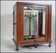 A SET OF CASED BALANCE SCALES, ' W and J George Ltd Birmingham 3, Nivoc,