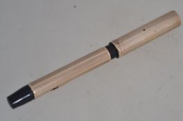 A 1930's Art Deco fountain pen with gold plated cover to barrel and cap having a 14ct nib.